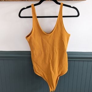 Mustard yellow ribbed thong bodysuit